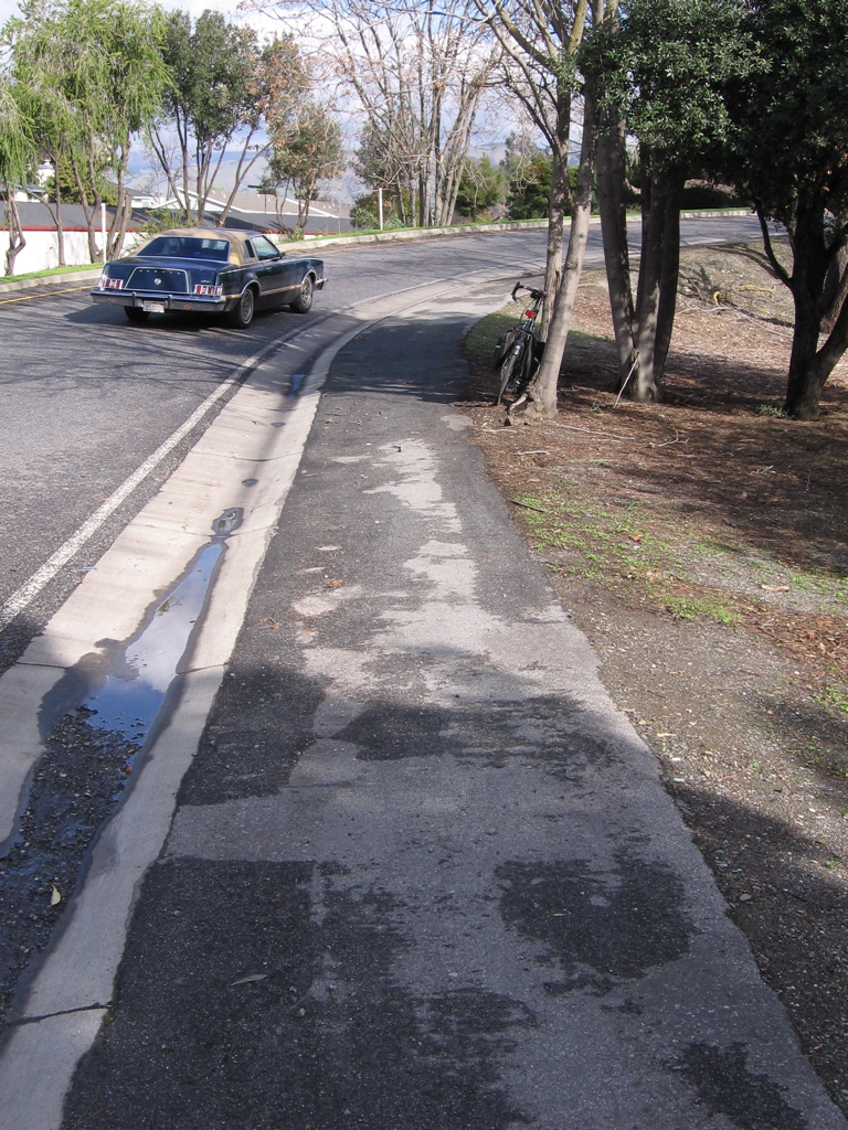 On-ramp sidewalk from below. (NE side)