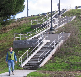 Staircase closeup with Akos Szoboszlay from MTS, which forced removal of discriminatory, illegal and unsafe "pedestrians prohibited" signs from Capitol Expressway in 1997.