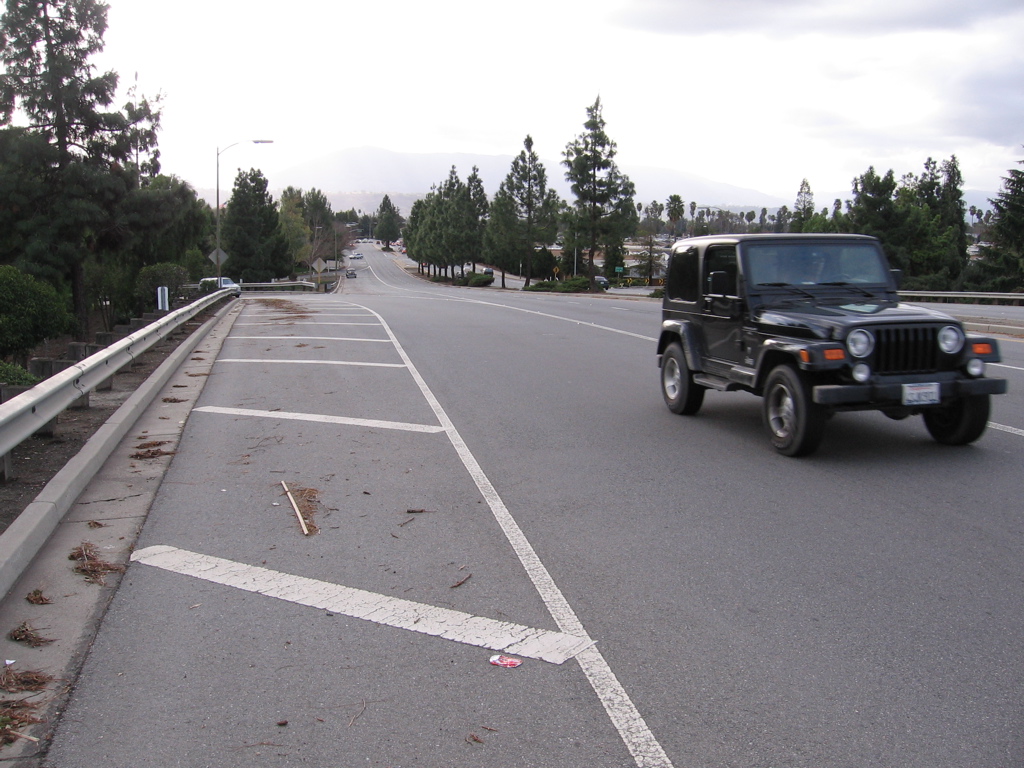 Option 1: Restore shoulder with optional zerbra striping. (Shown: it's already on part of the bridge.)