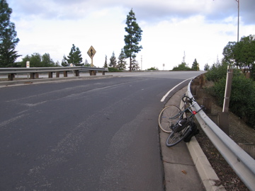 On-ramp needs ped/bike facility. There is plenty of room on the ramps. (SW side)