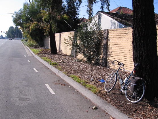 Open the wall near here and create path along San Tomas to El Camino (at signal).