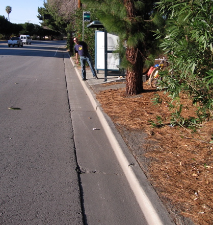 Path to bus stop needs to be extended beyond intersection.