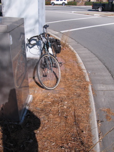 (a) create path in front of electrical boxes, (b) reduce the curve radius by building a sidewalk out from curve, ...