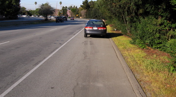 There is plenty of room for walkers if there is room for a car. Car had stopped and people got out to change drivers.