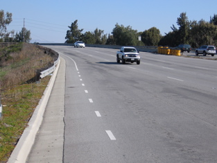 San Tomas bridge over Caltrain has a "wide shoulder" but can easily be widened to not intimidate walkers.